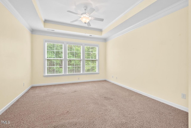 108 Teagan Ct, Chapel Hill, NC 27516 - spare room with carpet floors, ornamental molding, a tray ceiling, and a ceiling fan