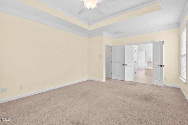 108 Teagan Ct, Chapel Hill, NC 27516 - unfurnished bedroom with light carpet, ornamental molding, a tray ceiling, and connected bathroom