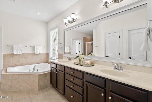 108 Teagan Ct, Chapel Hill, NC 27516 - bathroom with double vanity, a garden tub, tile patterned floors, and a shower stall