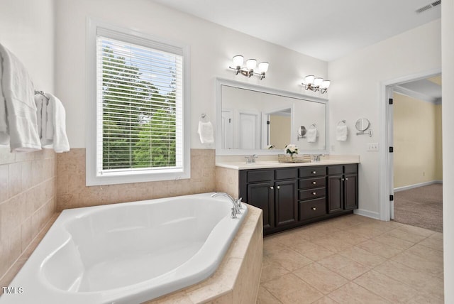 108 Teagan Ct, Chapel Hill, NC 27516 - bathroom with double vanity, a bath, healthy amount of natural light, and tile patterned flooring