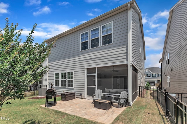2969 Thirlestane Dr, Apex, NC 27502 - back of property with a fenced backyard, a patio, and an outdoor living space with a fire pit