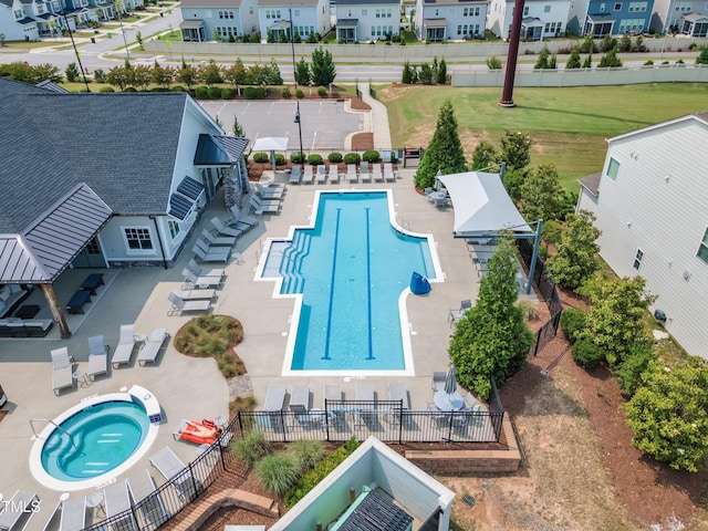 2969 Thirlestane Dr, Apex, NC 27502 - community pool with a hot tub, a residential view, and a patio