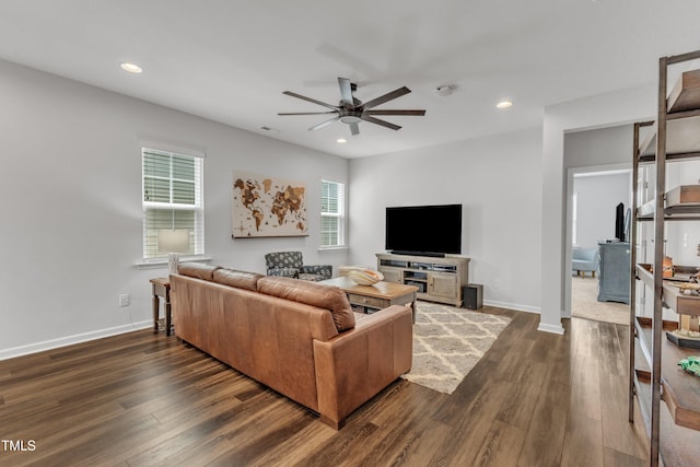 2969 Thirlestane Dr, Apex, NC 27502 - living area with ceiling fan, dark wood-style floors, and recessed lighting