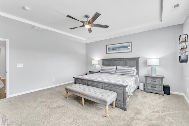 2969 Thirlestane Dr, Apex, NC 27502 - bedroom featuring a tray ceiling, light carpet, and ceiling fan