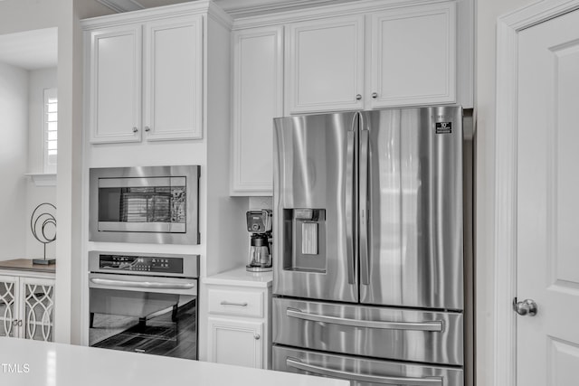 2969 Thirlestane Dr, Apex, NC 27502 - kitchen with stainless steel appliances, white cabinetry, and light countertops