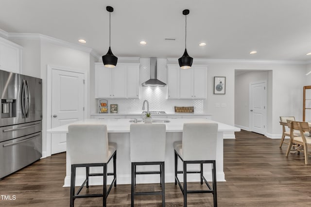 2969 Thirlestane Dr, Apex, NC 27502 - kitchen with stainless steel fridge, wall chimney range hood, light countertops, decorative backsplash, and white cabinetry