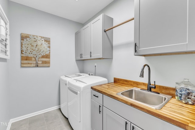 2969 Thirlestane Dr, Apex, NC 27502 - laundry area featuring cabinet space and independent washer and dryer