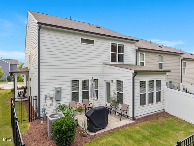 1038 Felman Rd, Durham, NC 27703 - back of property featuring a patio
