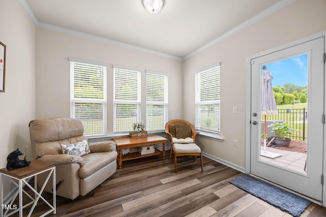 1038 Felman Rd, Durham, NC 27703 - sitting room with wood finished floors and ornamental molding