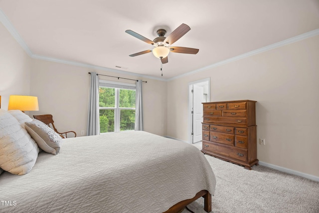1038 Felman Rd, Durham, NC 27703 - bedroom with crown molding, carpet floors, and ceiling fan