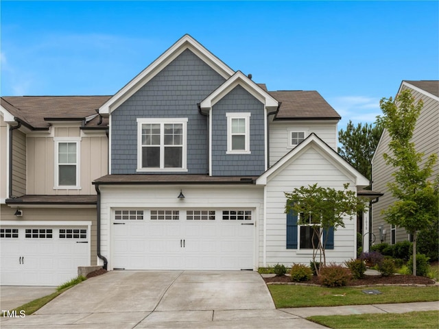 1038 Felman Rd, Durham, NC 27703 - view of front of home with driveway and a garage