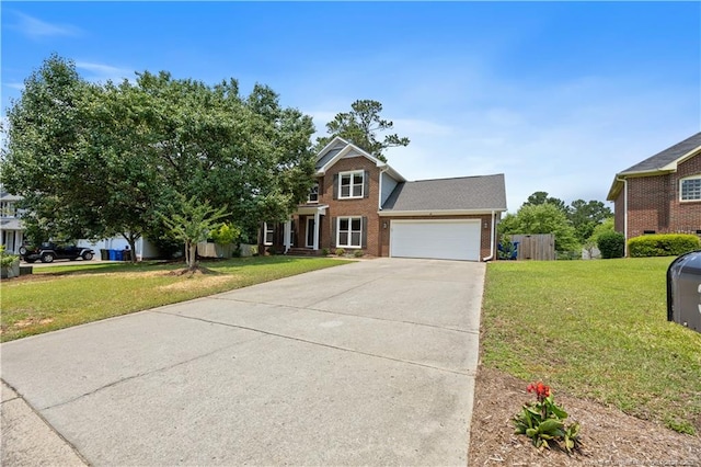 3517 Gables Dr, Fayetteville, NC 28311 - view of front of house with brick siding, driveway, and an attached garage