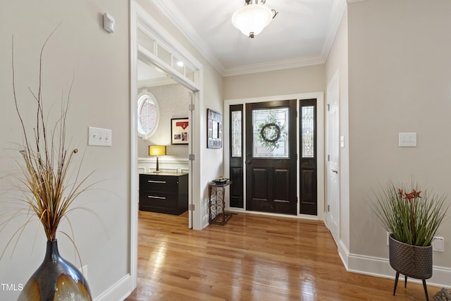 1831 Middlebrook Dr, Raleigh, NC 27615 - entryway featuring light wood-style floors, crown molding, and plenty of natural light