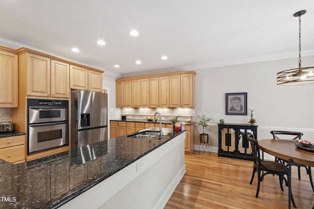 1831 Middlebrook Dr, Raleigh, NC 27615 - kitchen featuring stainless steel appliances, ornamental molding, decorative backsplash, light brown cabinetry, and recessed lighting