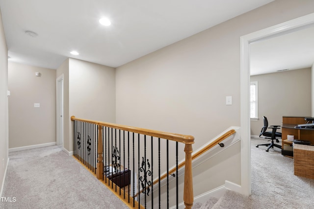 1831 Middlebrook Dr, Raleigh, NC 27615 - hall with an upstairs landing, carpet flooring, recessed lighting, and an office area