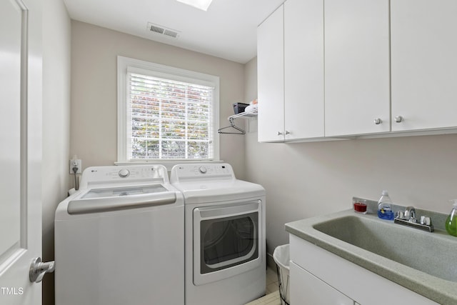 1831 Middlebrook Dr, Raleigh, NC 27615 - laundry room with separate washer and dryer and cabinet space