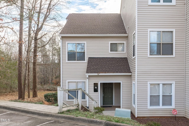 6131 Summerpointe Pl Unit 101, Raleigh, NC 27606 - view of front of home featuring a shingled roof