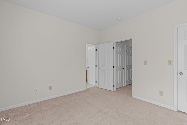 6131 Summerpointe Pl Unit 101, Raleigh, NC 27606 - unfurnished bedroom featuring carpet floors and baseboards