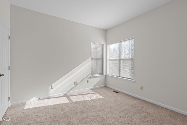 6131 Summerpointe Pl Unit 101, Raleigh, NC 27606 - carpeted empty room featuring baseboards