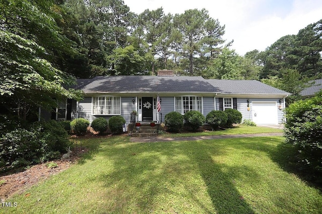 6717 Valley Dr, Raleigh, NC 27612 - single story home featuring a garage, a chimney, and a front lawn