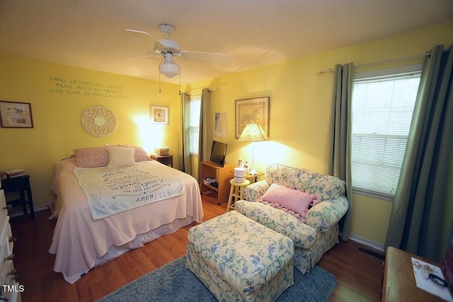 6717 Valley Dr, Raleigh, NC 27612 - bedroom with wood finished floors and a ceiling fan