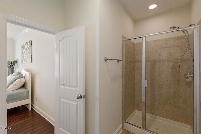 531 Finnbar Dr, Cary, NC 27519 - full bath with a stall shower, wood finished floors, recessed lighting, and ornamental molding