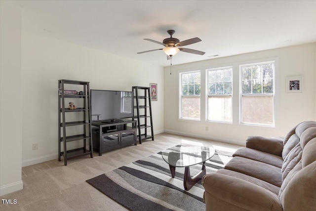 531 Finnbar Dr, Cary, NC 27519 - living area featuring light colored carpet and a ceiling fan