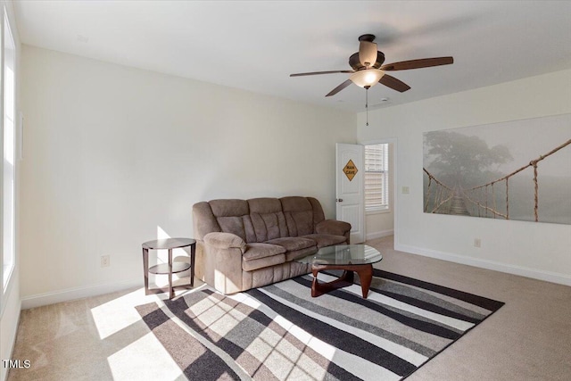 531 Finnbar Dr, Cary, NC 27519 - living room with light carpet and a ceiling fan