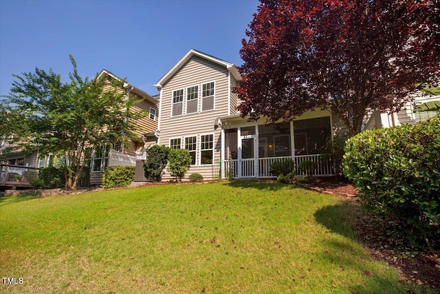 531 Finnbar Dr, Cary, NC 27519 - back of property with a yard and a sunroom