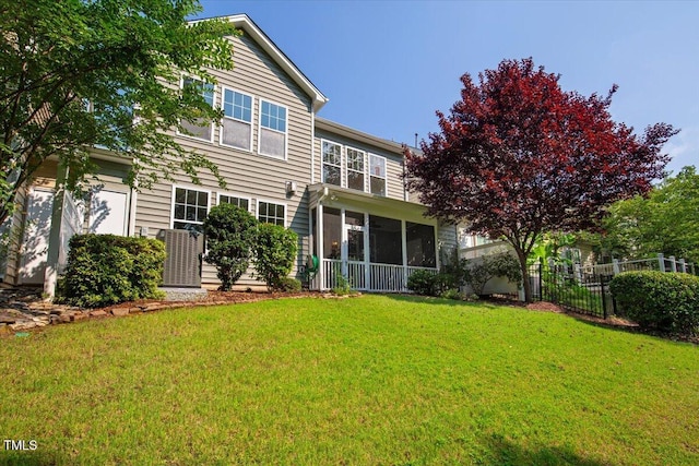 531 Finnbar Dr, Cary, NC 27519 - rear view of house with a sunroom