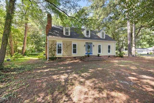 1013 Oak Forest Dr NW, Wilson, NC 27896 - new england style home with crawl space and a chimney