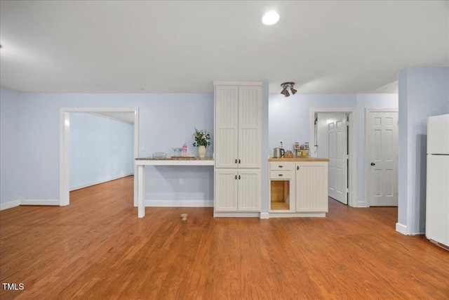 1013 Oak Forest Dr NW, Wilson, NC 27896 - additional living space with light wood-type flooring and baseboards