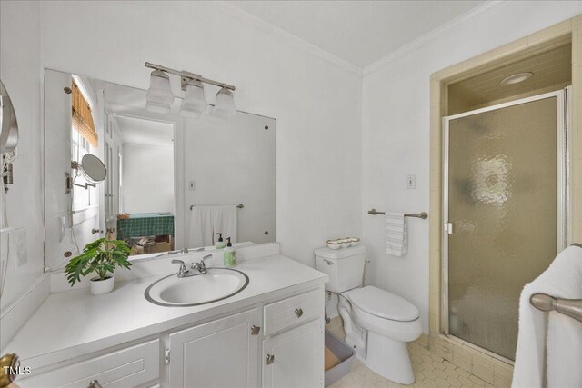 1013 Oak Forest Dr NW, Wilson, NC 27896 - full bath featuring ornamental molding, vanity, a shower stall, and tile patterned floors