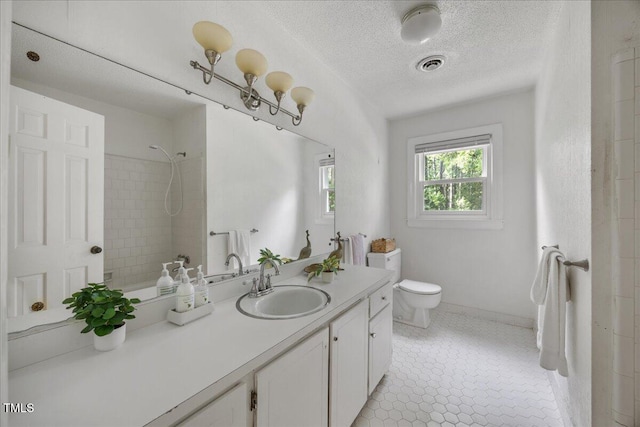 1013 Oak Forest Dr NW, Wilson, NC 27896 - full bathroom with vanity and a textured ceiling