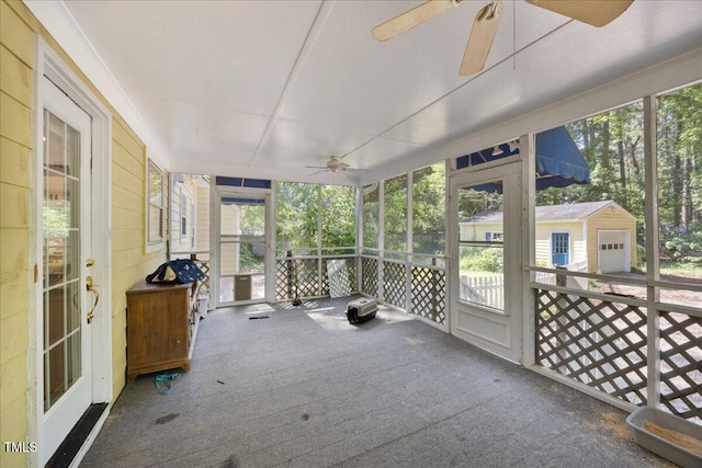 1013 Oak Forest Dr NW, Wilson, NC 27896 - unfurnished sunroom with a ceiling fan and healthy amount of natural light