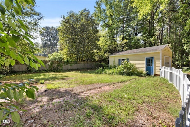 1013 Oak Forest Dr NW, Wilson, NC 27896 - fenced backyard with an outdoor structure and a garage