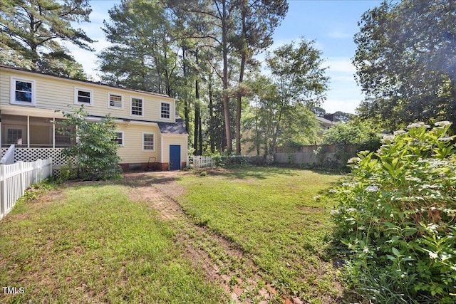 1013 Oak Forest Dr NW, Wilson, NC 27896 - fenced backyard featuring a sunroom