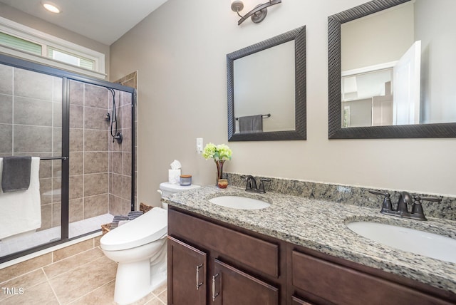 3037 Willow Ranch Dr, Fuquay Varina, NC 27526 - full bathroom with a shower stall, double vanity, and tile patterned flooring