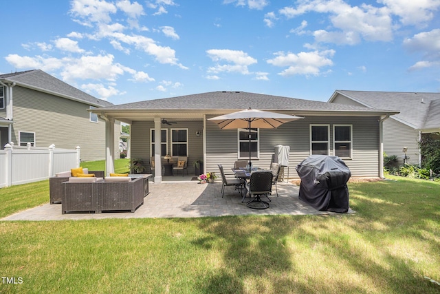 3037 Willow Ranch Dr, Fuquay Varina, NC 27526 - back of property featuring outdoor lounge area, a patio area, ceiling fan, and roof with shingles