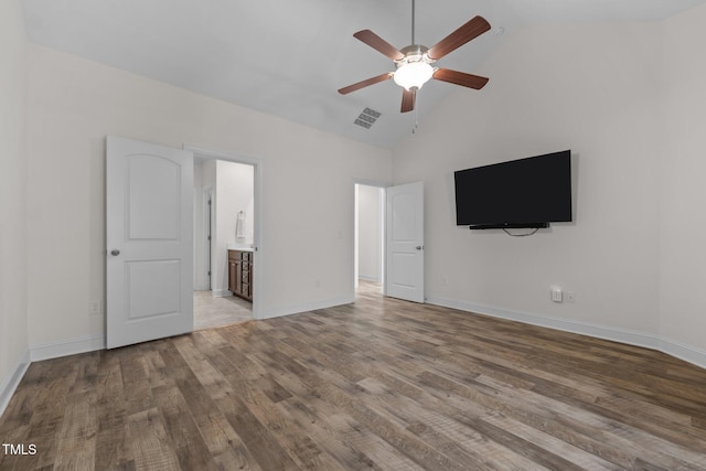 801 Socata Ln, Mebane, NC 27302 - unfurnished bedroom with wood finished floors, connected bathroom, high vaulted ceiling, and ceiling fan