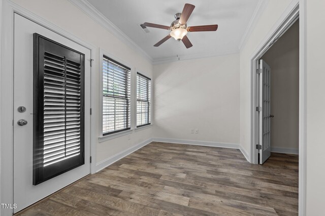 801 Socata Ln, Mebane, NC 27302 - unfurnished room with ornamental molding, ceiling fan, and wood finished floors