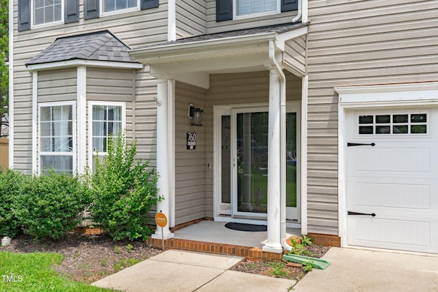 760 Stackhurst Way, Wake Forest, NC 27587 - view of exterior entry featuring a garage and a porch