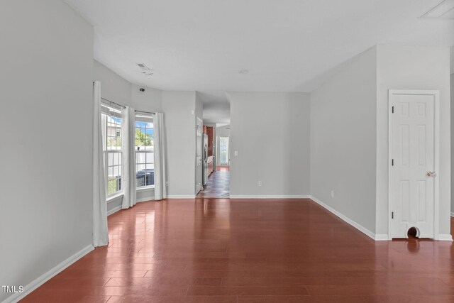 760 Stackhurst Way, Wake Forest, NC 27587 - unfurnished living room featuring wood finished floors