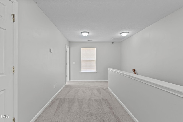 760 Stackhurst Way, Wake Forest, NC 27587 - hall featuring carpet flooring, an upstairs landing, and a textured ceiling