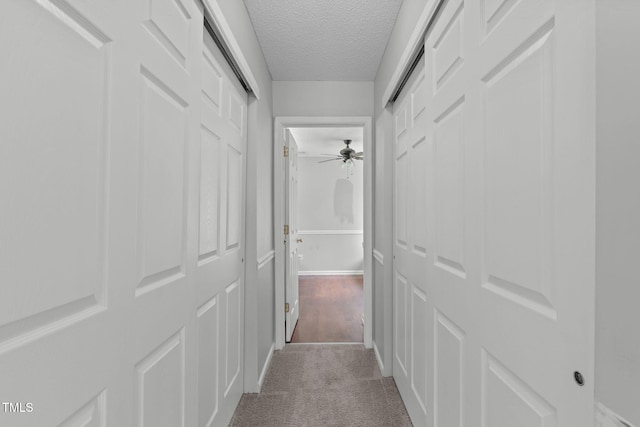 760 Stackhurst Way, Wake Forest, NC 27587 - hall with a textured ceiling and carpet