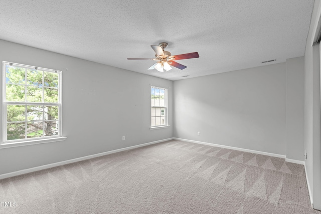 760 Stackhurst Way, Wake Forest, NC 27587 - empty room featuring carpet flooring, a ceiling fan, and a textured ceiling