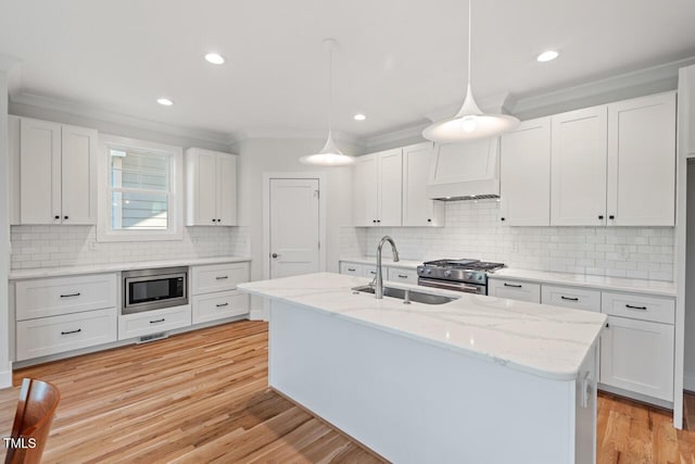 414 Wyndham Dr, Chapel Hill, NC 27516 - kitchen featuring appliances with stainless steel finishes, ornamental molding, decorative backsplash, white cabinets, and recessed lighting