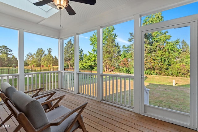 414 Wyndham Dr, Chapel Hill, NC 27516 - sunroom / solarium featuring ceiling fan, healthy amount of natural light, and view of wooded area
