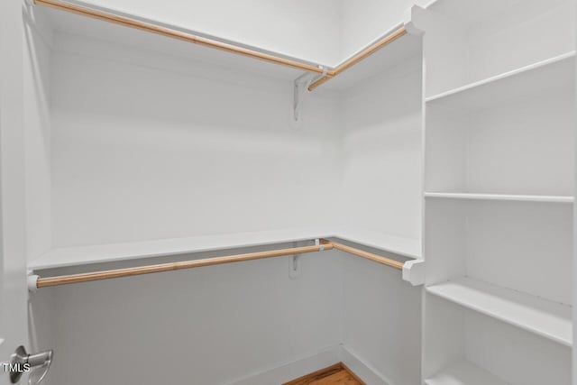 414 Wyndham Dr, Chapel Hill, NC 27516 - walk in closet featuring wood finished floors