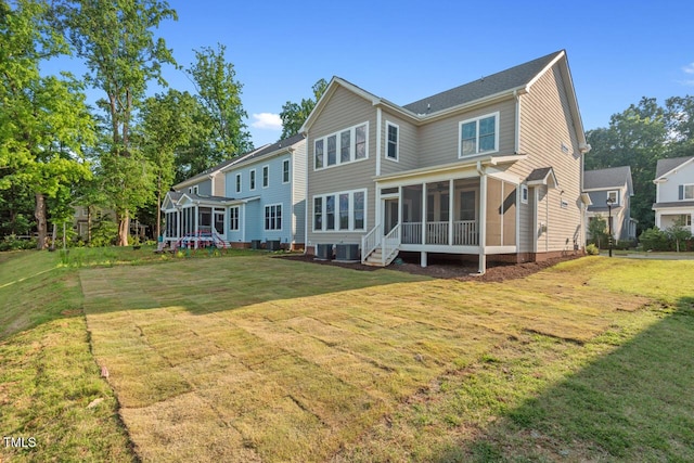 414 Wyndham Dr, Chapel Hill, NC 27516 - back of house with a sunroom and a yard